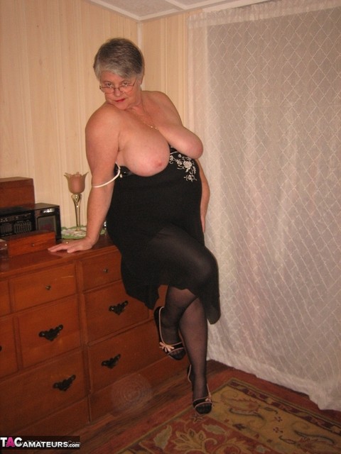 Overweight nan Girdle Goddess strips to her footwear in front of a dresser | Фото 8