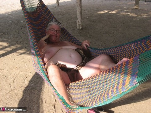 Obese nan Girdle Goddess bares her large tits and fat belly on a hammock | Фото 11