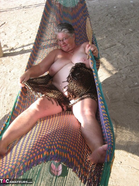 Obese nan Girdle Goddess bares her large tits and fat belly on a hammock | Фото 6