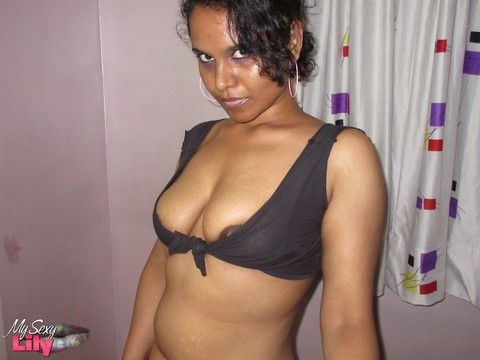 Overweight Indian solo girl sniffs her panties before exposing her boobs