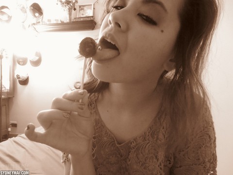 Amateur Japanese Sydney Mai having fun toying and licking with lollipop | Фото 3