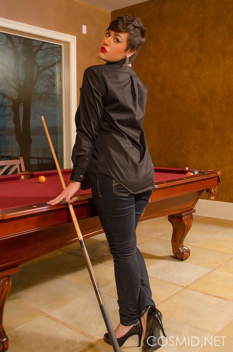 Thick woman with short hair Annalise bares her big tits and butt on pool table