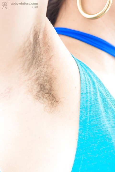 Hairy brunette amateur Sabina M showing off furry underarms and bush | Фото 1