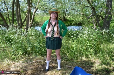 Amateur with red hair frees her tits and twat from Ann of Green Gables outfit