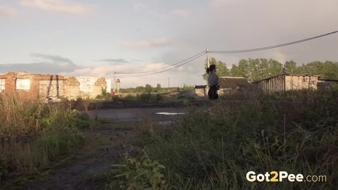 Leggy girl Kristina takes a piss behind a dilapidated building | Фото 15