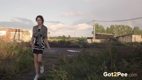 Leggy girl Kristina takes a piss behind a dilapidated building | Фото 2