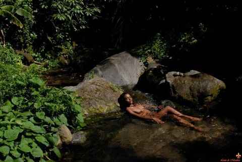 Black girl Lina takes off her bikini to lounge naked in a pool of freshwater | Фото 12