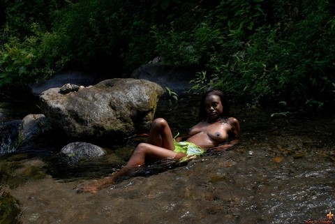 Black girl Lina takes off her bikini to lounge naked in a pool of freshwater | Фото 9