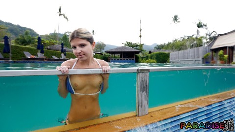 Slim teen Gina Gerson looses her small titties from a bikini by a pool | Фото 11