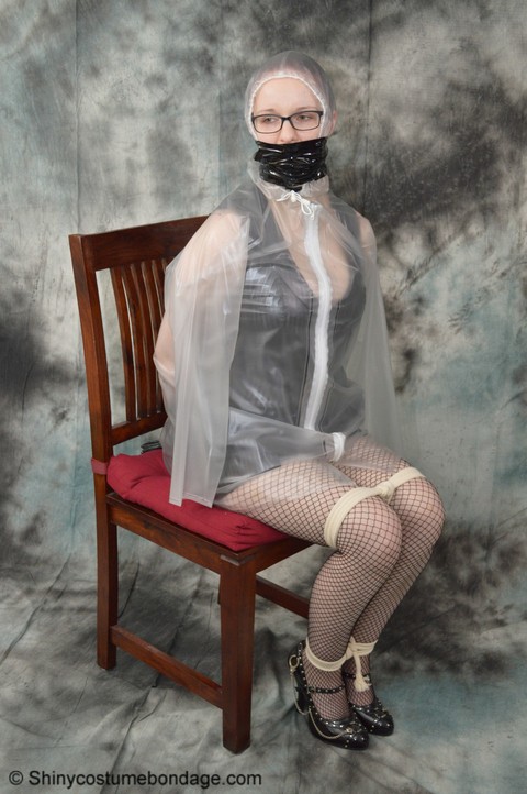 Redhead Lady Nadja is gagged & restrained before being covered with a raincoat | Фото 15