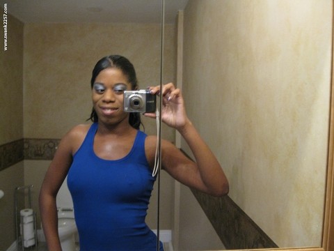 Ebony amateur takes nude selfies in a bathroom mirror during solo action