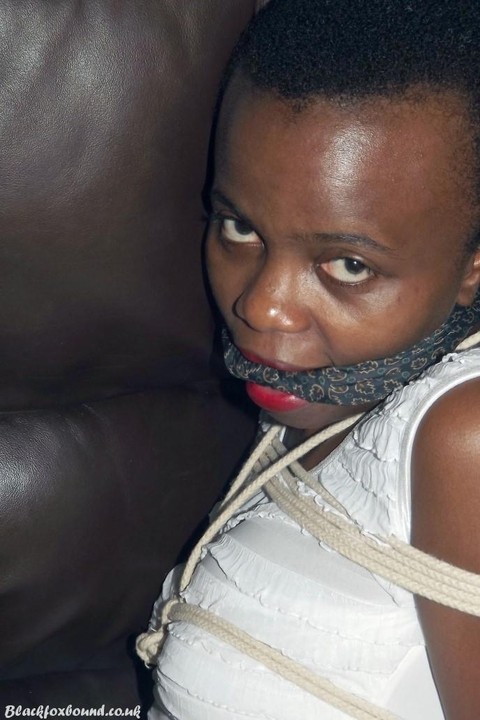 Black female is left tied and cleave gagged in a white dress on a leather sofa | Фото 10