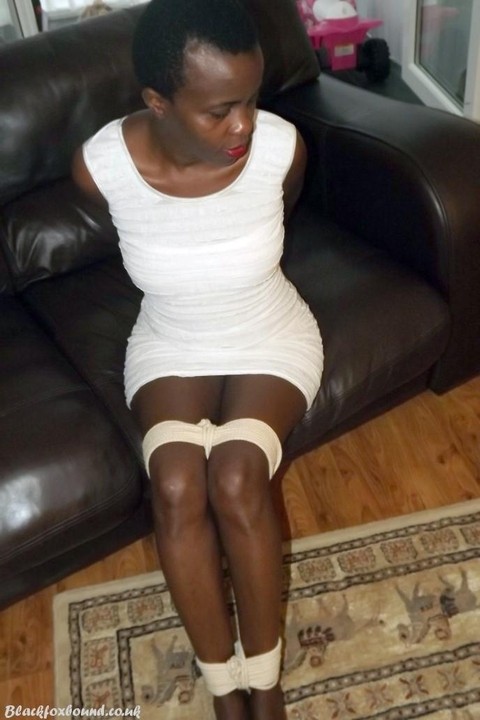 Black female is left tied and cleave gagged in a white dress on a leather sofa | Фото 3