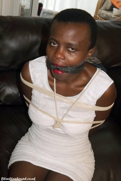 Black female is left tied and cleave gagged in a white dress on a leather sofa | Фото 7