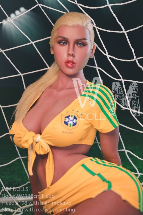 Brazilian sex doll Mariana undressing and posing naked on a soccer field  | Фото 1