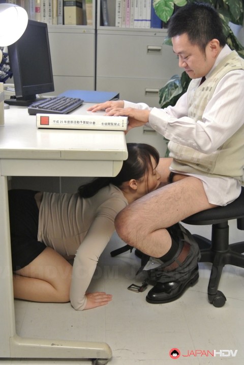 Shy Japanese secretary Sayaka Aishiro blows off her boss underneath the desk