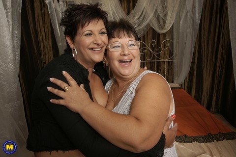 Two mature lesbians are going mad about tasting younger babe's sweet pussy | Фото 2