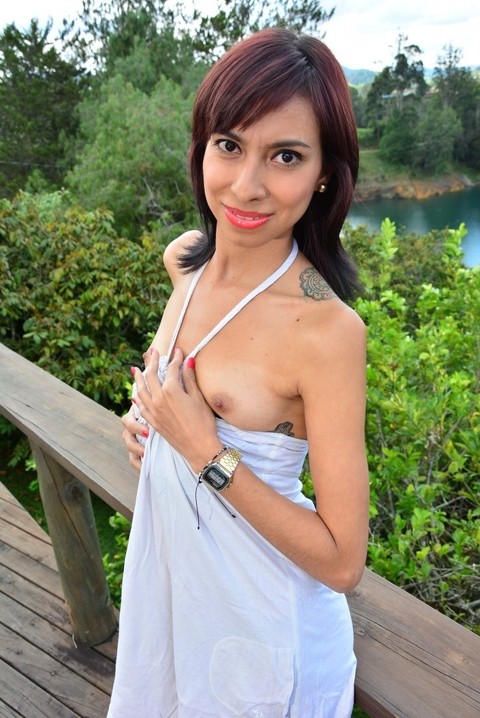 Skinny redhead Latina Ximena Soto shows off her tiny tits outdoors | Фото 12