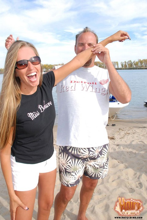 Hot blonde Lori Anderson in shorts flaunting her long arm hair on the beach | Фото 15