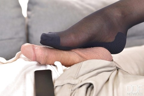 The nylon covered feet of fully clothed lady Dolly Diore jerking cock | Фото 5