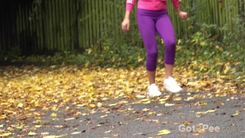 Blonde girl Victoria Pure pulls down her tights for a pee while out for a walk | Фото 1