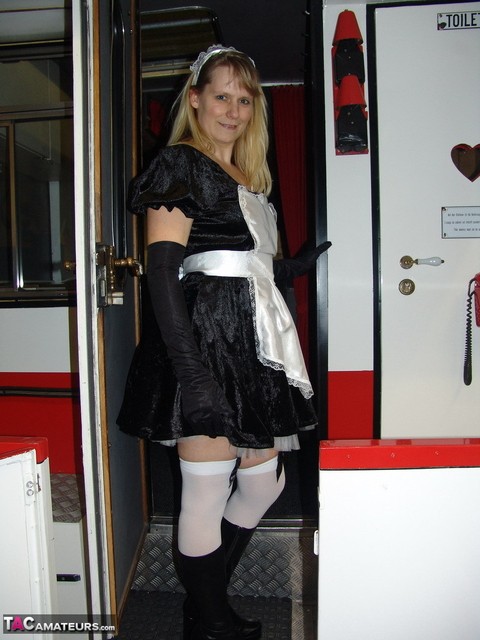 Blonde maid Sweet Susi takes off her uniform while inside a motorhome | Фото 1