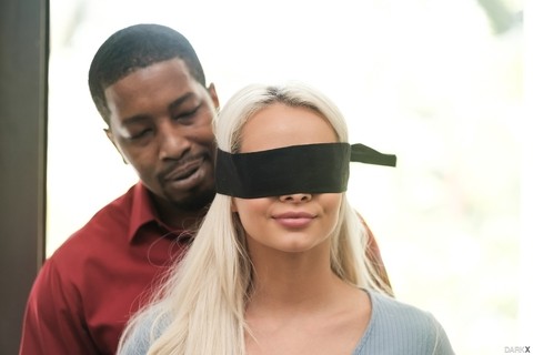 Hot girl Elsa Jean is freed from a blindfold prior to her interracial fucking