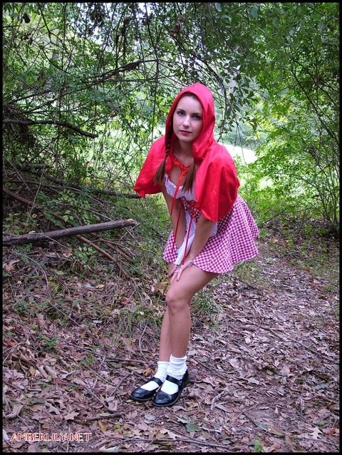 Amateur girl Amber Lily frees tits and twat from Little Red Riding Hood outfit