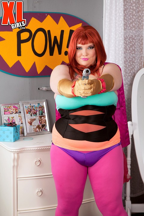 Redheaded fatty Kitty Mcpherson releases her large boobs from cosplay attire | Фото 1