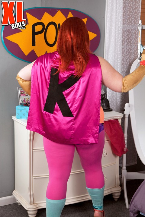 Redheaded fatty Kitty Mcpherson releases her large boobs from cosplay attire