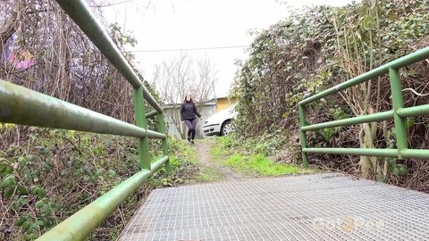 Solo girl Victoria Daniels squats to take a piss before crossing a footbridge | Фото 1