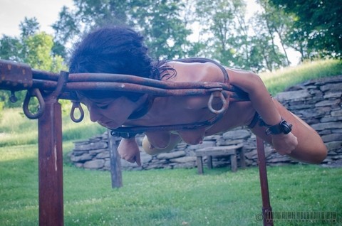 Female slave London River is restrained in a variety of ways in a yard | Фото 10