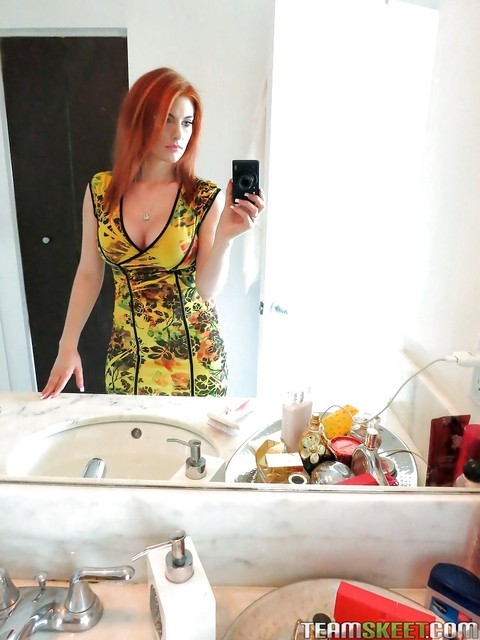 Amateur redhead girl Rainia Belle makes sexy, amusing self shots | Фото 1