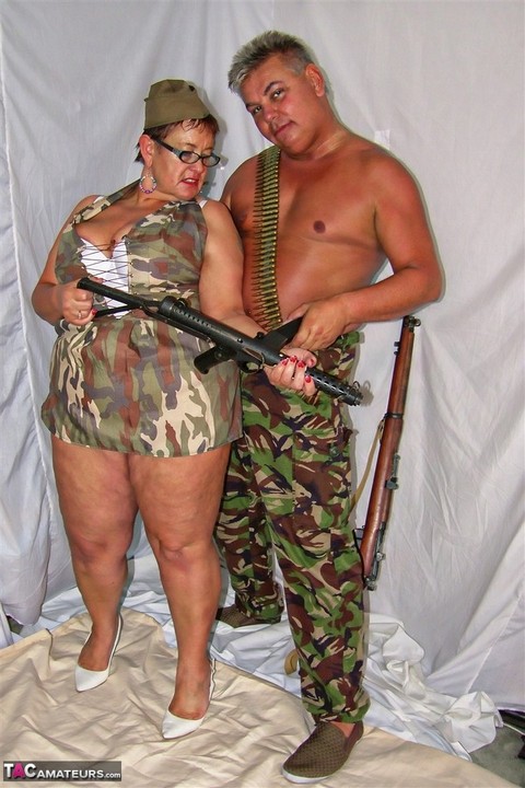 Mature fatty with huge boobs sucks a military a man's dick