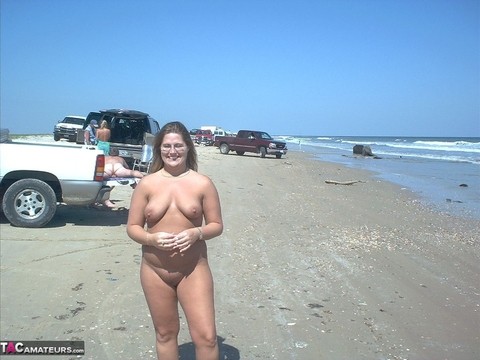 Glasses wearing amateur BBW gets gangbanged on a nude beach | Фото 7