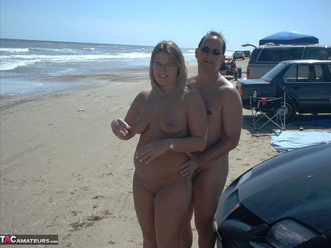 Glasses wearing amateur BBW gets gangbanged on a nude beach | Фото 8