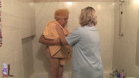 BBW granny Clara lets her lesbian caregiver finger her horny pussy | Фото 16