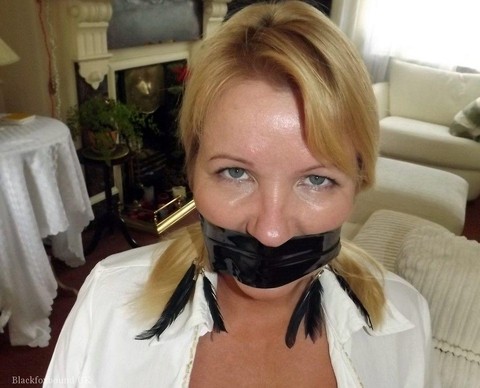 Blonde woman is silenced with duct tape while her tits are bound with rope | Фото 10