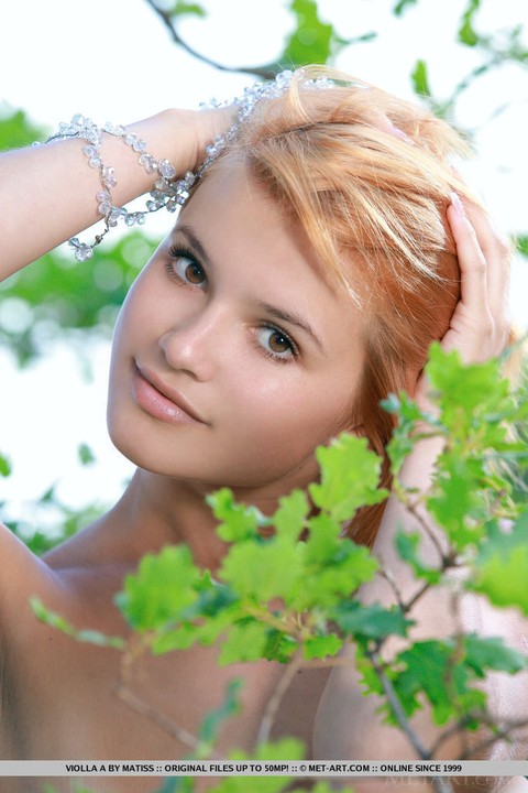 Adorable redhead Violla A displays her naked teen body atop a rock outdoors | Фото 18