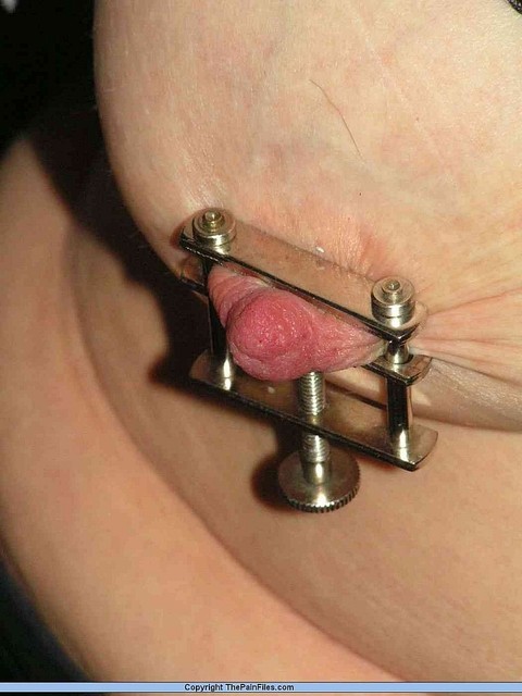 Restrained blonde lady has her nipples clamped and pierced with needles | Фото 3