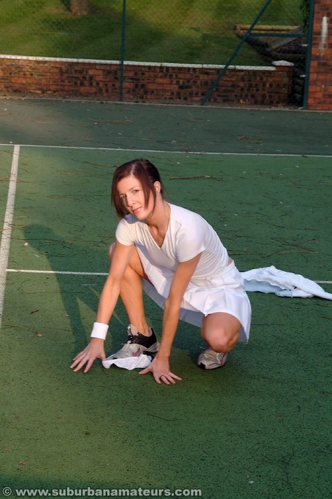 Hot British tennis player Olivia strips & masturbates on the court