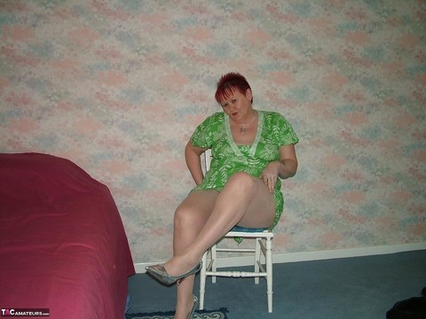 Older redhead BBW Valgasmic Exposed strips to pantyhose atop a wooden chair | Фото 10