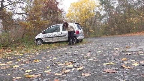 White girl Nicolette Noir takes a piss beside a parked car in a wooded setting | Фото 2